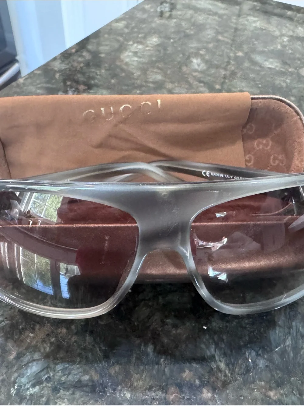 Gucci Clear Frame Sunglasses with Brown Gradient Lenses